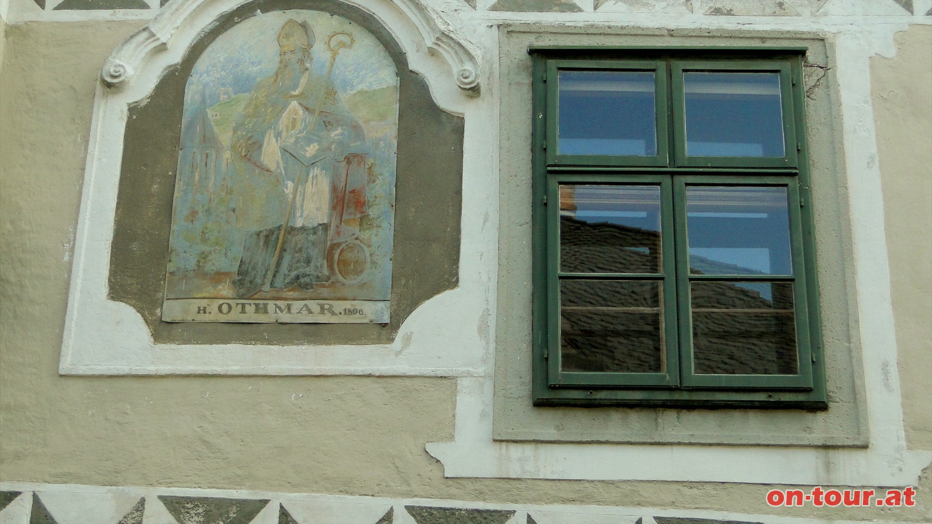 ....dem Jahre 1564. Am Gebude ist ein Fresko des H. Othmar, dem Stadtpatron von Mdling, zu sehen.