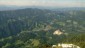 Im N die langgestreckten Fischbacher Alpen. Dahinter, am Horizont, der Hochschwab, die Veitsch u. die Schneealpe (li. nach re.) Im Tal befindet sich St. Jakob-Breitenau.